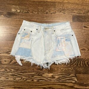 Carmar distressed patched jean shorts. Size 28